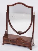 An Edwardian mahogany and inlaid swing frame platform toilet mirror:,