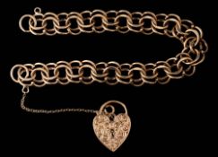 A 9ct gold circular-link bracelet: with heart-shaped padlock clasp approximately 20gms gross weight.