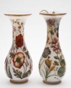 A pair of French opaline glass vases: attributed to Baccarat, with slender waisted necks,