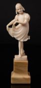 A late 19th century Continental carved ivory figure,