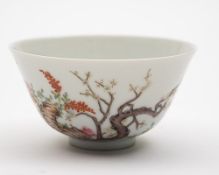 A small Chinese famille rose flared bowl: painted with sheep in a continuous landscape with