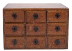 An 18th Century Continental oak spice chest:,