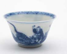 A small Chinese blue and white wine cup: with flaring rim,