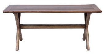 A 19th Century farmhouse kitchen table:, with a rectangular fruitwood cleated triple plank top,