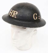 A WWII Mk II pattern Heavy Rescue steel helmet: black with the letter 'HR' to front and back,