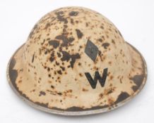 An early WWII pre-standardisation Mk II Head Warden's steel helmet: white with single black diamond