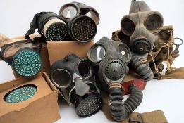 Seven WWII period gas masks: including a Civil Defence pattern mask (7)
