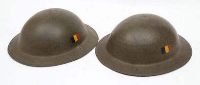 Two Mk II pattern steel helmets: both in green with hand painted Belgian flag to one flank (2)