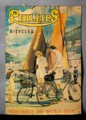 A tinplate 'Phillips Bicycles' advertising sign: depicting a cycling couple on a quay inscribed
