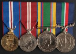 An Elizabeth II group of four commemorative medals: Golden Jubilee Medal 2002,