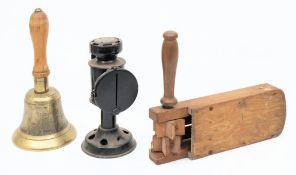 A WWII Fiddian ARP bell: with wooden handle, stamped 'JB39' to top of bell,