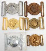 A Scots Guards brass belt buckle: together with five others, Royal Navy, Royal Logistics Corps,