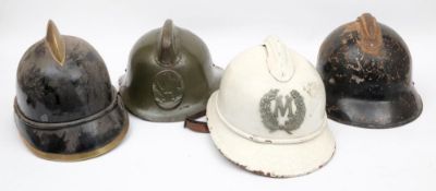 A Russian Fire Service steel helmet: together with a Belgian white cork fire service helmet and two