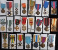 A group of French orders and decorations: including a WWI Minor Combatant medal,