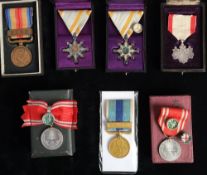 A group of Japanese medals: including two Red Cross Member medals,