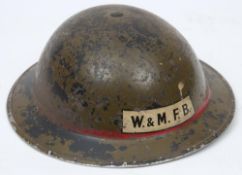 A WWII Auxiliary Fire Service Leading Fireman's Mk II steel helmet 'W&M FB': green with single red