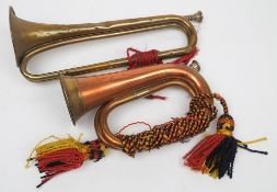 A WWII period copper and brass bugle stamped 'Nadir Ali & Co, Meerut,