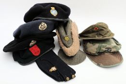 A group of various military berets and cloth caps: (a lot)