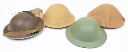 A WWII Mk II 4A pattern steel helmet: black with canvas cover, original liner and chinstrap,