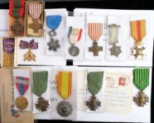 A group of French orders and decorations: including two Croix De Guerre,