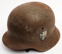 A WWII German M40 pattern steel helmet by Vereinigte Deutsche Nickelwerke / Schwerte: traces of