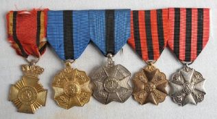 Seven framed displays of reproduction Foreign Medals: including Russian,