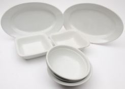 A group of NSDAP and Luftwaffe white glazed table ware: various factories comprising two oval meat