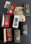 A group of seven Women's Voluntary Service Long Service Medals: six in case of issue, all unnamed.