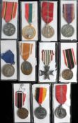 A WWII German West Wall Medal: together with two East Front Medals,