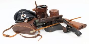 A WWI period Sam Browne belt with holster: date stamped 1918 to one cartridge pouch,