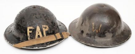 A WWII Warden's Mk II steel helmet: with letter 'W' front and back, dated stamped 1938 to lug,