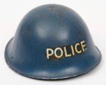 A mid 20th century Police MK III 'turtle' steel helmet: blue with transfer to front,