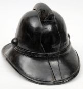 A mid 20th century NFS fireman's cork helmet circa 1940s/50s: black with central comb and button