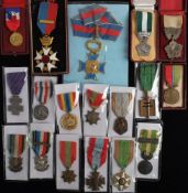 A collection of French medals and orders: including a Medal of the Order of Agricultural Merit,