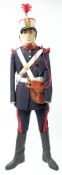 A Spanish Royal Guard uniform: comprising peaked cap with red feather plume and gilt cap badge,