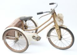 A Raleigh 'Winkie' tricycle: in gold and white,