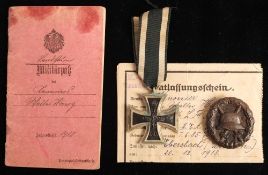 A WWI Iron Cross, Second Class and Wound Badge attributable to 'Walter Herzog.