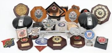 A collection of MG Car Club enamel radiator and bar badges: together with MG Car Club Rally