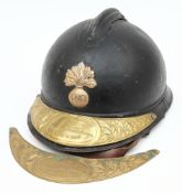 A WWI French Army Adrian pattern steel helmet: painted black with gilt flaming grenade helmet plate