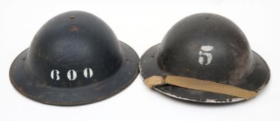 Two WWII 'Factory' Mk II steel helmets: one numbered '5' and dated stamped 1939 under rim,