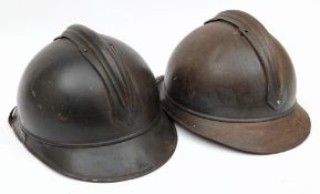 Two WWI French Army Adrian pattern steel helmets,
