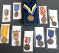 A Visit of The Prince of Wales to Bombay Medal 1921: together with a 1955 Red Coat Medal,