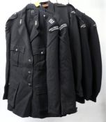 Three Devonshire Constabulary Special Constable Reserve uniforms and two jackets.