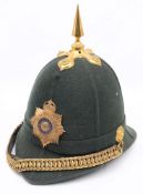 A Royal Marines green cloth helmet: with gilt metal cross piece, spike and rose bosses,