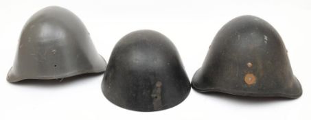 Two Danish M23/41 pattern steel helmets and a Czechoslovakian post War steel helmet: (3)