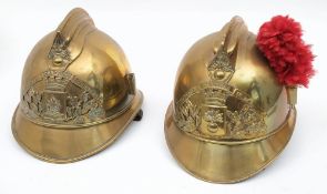 Two early 20th century French Fire Service brass helmets: for 'Courteron' and 'De Ham',