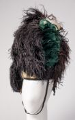 An Irish Guards Ostrich feather bonnet: with four tails and green/white hackle,