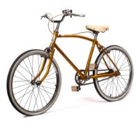 A Raleigh 'Chico' child's bicycle: gold frame with white decals, plated handlebars,