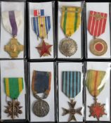 A group of mixed foreign medals including a Romanian WWII Commemorative Cross: a Romania Balkan
