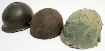 An American M1 pattern steel helmet: together with a Belgian steel helmet and one other (3)